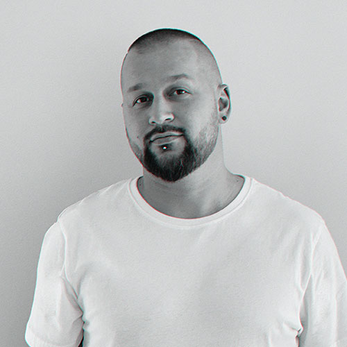Smart Block Hunter, professional trader reviewing Grid Master Futures Trading Bot, grayscale headshot.